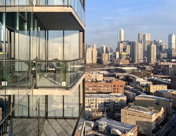 the view of the city from the top of a skyscraper